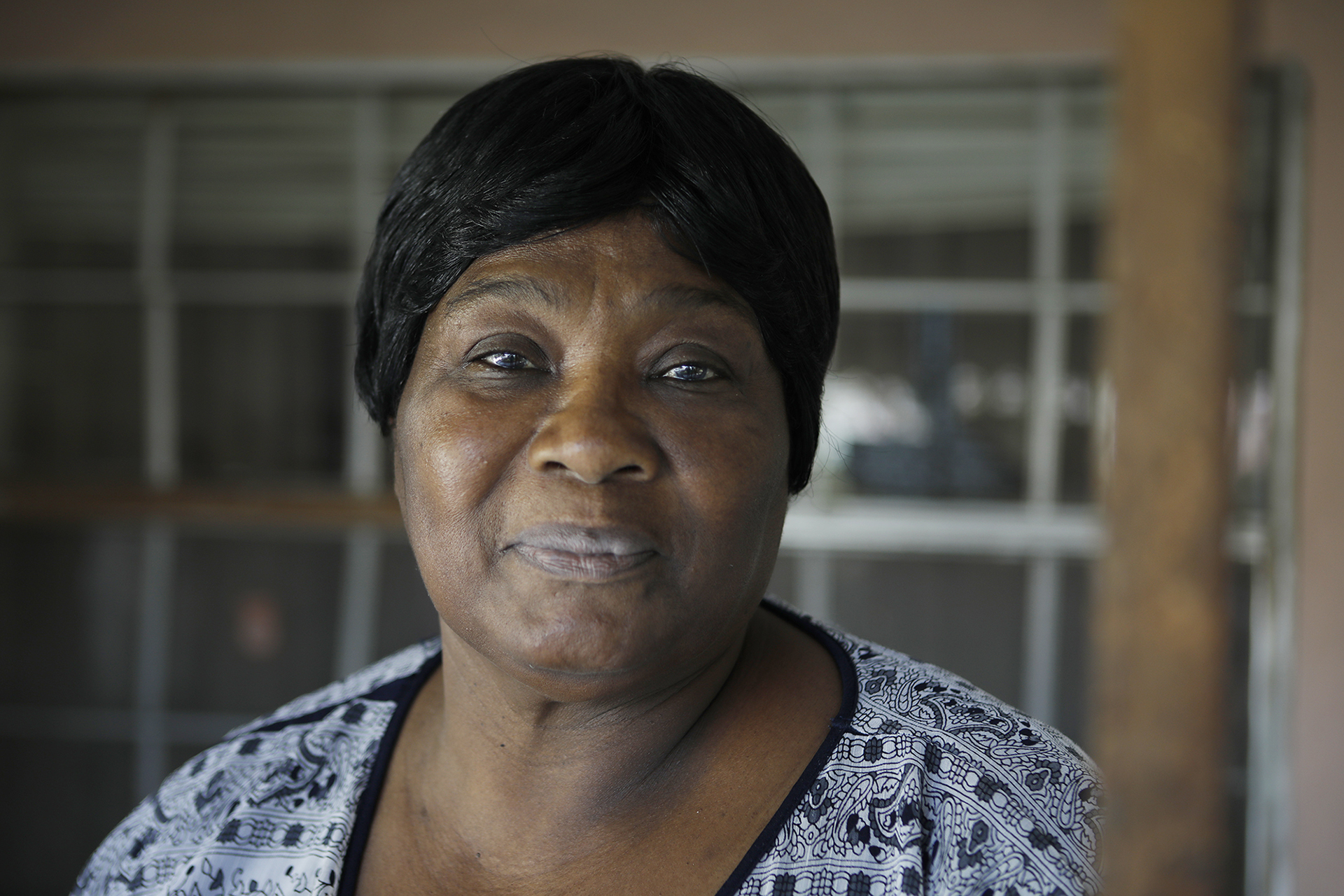 Madelaine Dumeus pose for a portrait where she lives in Tampa, Florida on Thursday, January 23, 2020. Madelaine Dumeus brother Prospere Dumeus, a Haitian immigrant, worked 32 years at a local lead smelter, suffering gruesome burns and multiple heart surgeries, until his health collapsed in late 2017. He died last Feb of multiple ailments that could have been caused by lead exposure on the job - heart disease, kidney disease and brain damage.