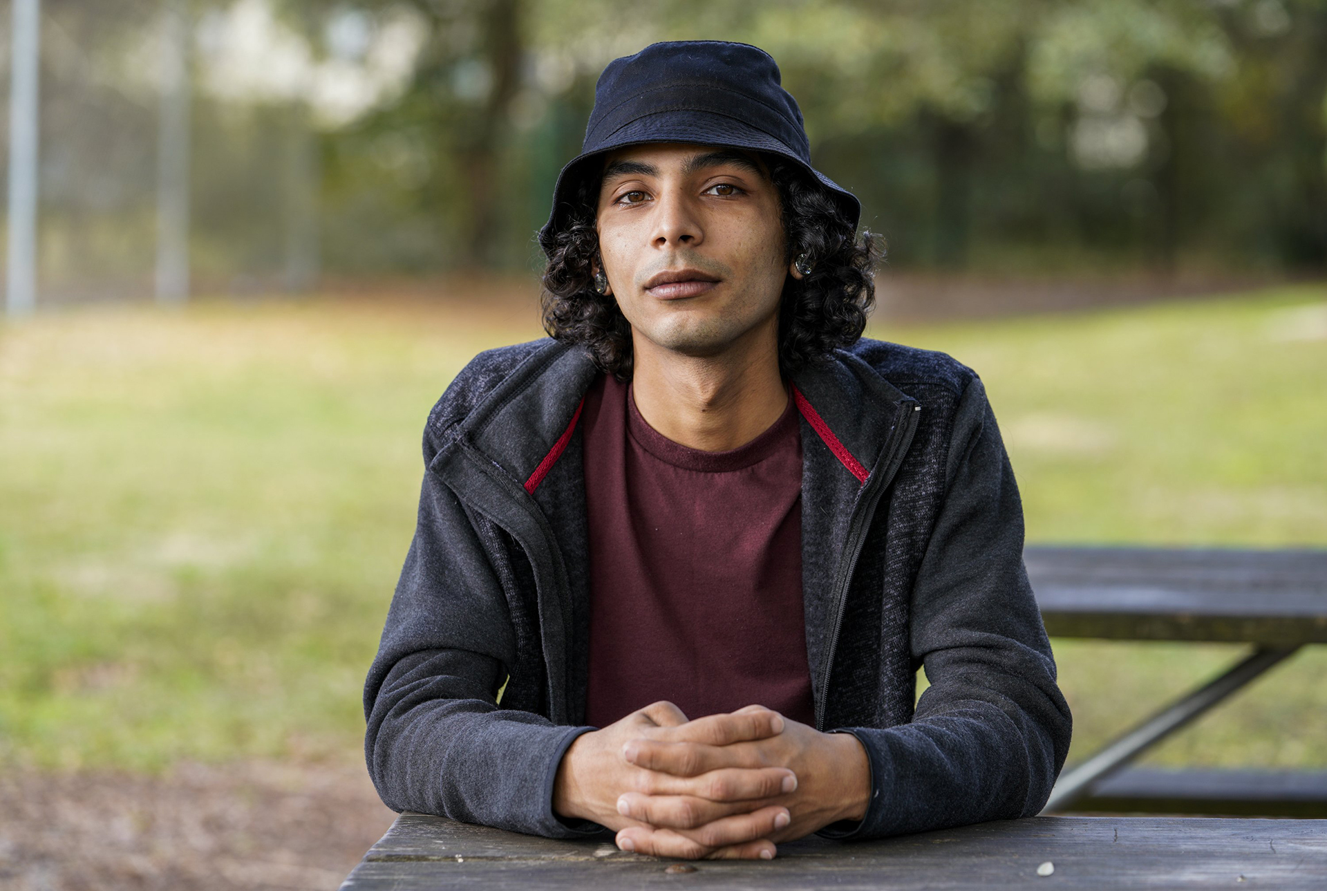 Jacob Clemente, 26, a former contractor at for BNN Welding who worked at Gopher Resource for three months in 2013, sits for a portrait outside his home. Clemente recalls an incident in which after shaking bags in the bathhouse, he passed out and woke up in an ambulance. Doctors treated him for trouble breathing and shortly after he developed chest Pais that persist regularly. Clemente describes the environment as rundown and unclean. “The packhorse itself was old and dusty.” Monday, Feb. 8, 2021 in Brandon.
