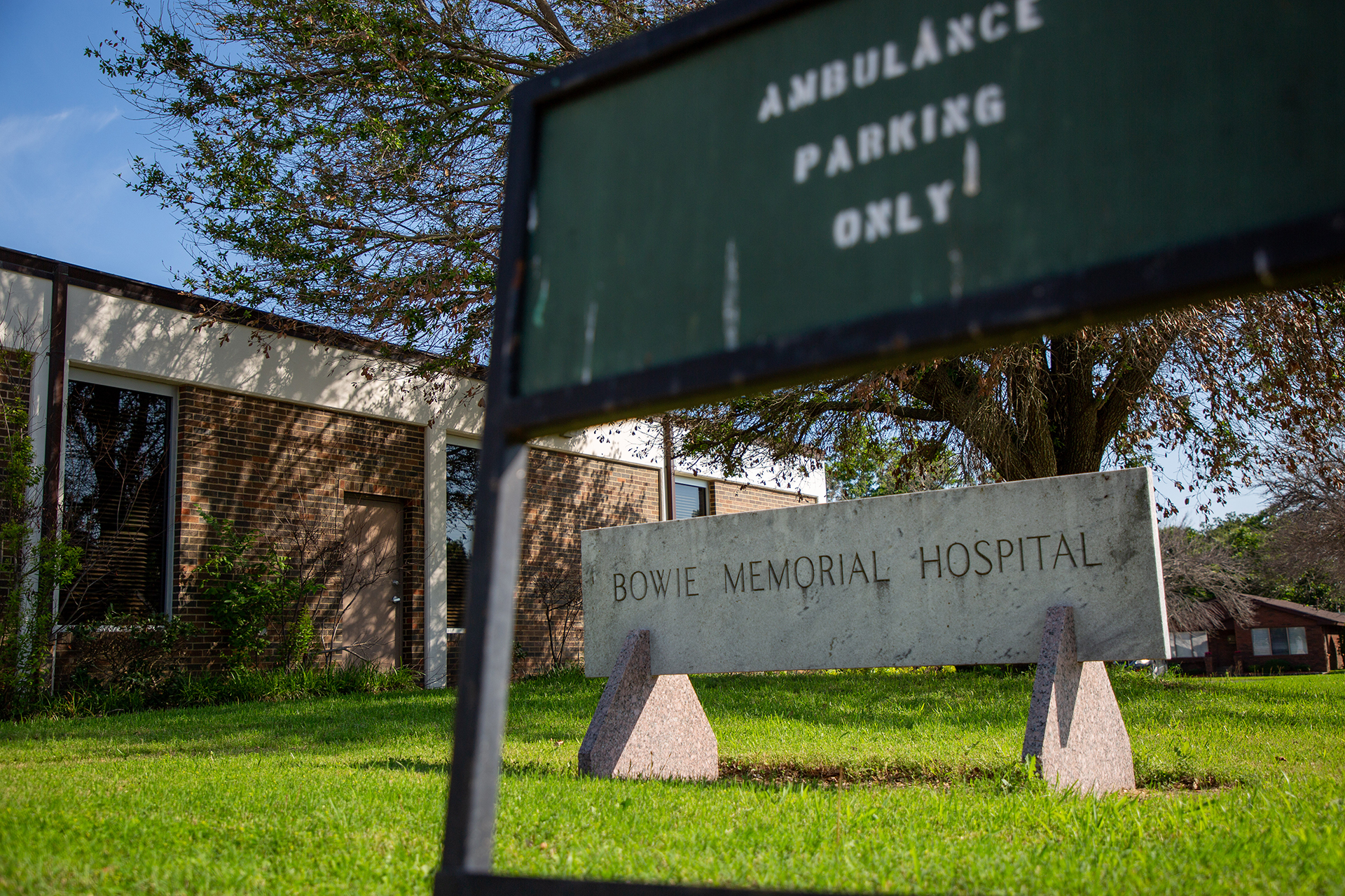 The former hospital sign of Bowie Memorial Hospital still stands, but their emergency department has been closed for over a year.