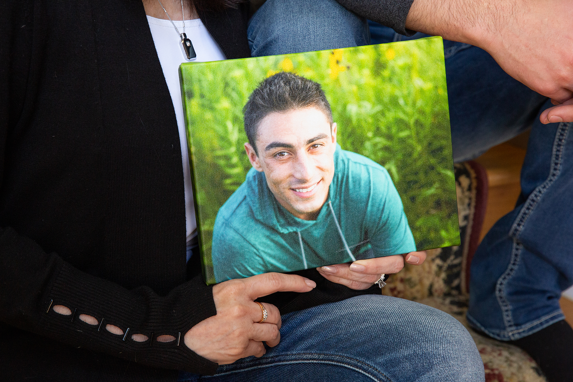 (Kristan Lieb | Special to The Salt Lake Tribune) Susan Neese holds a photo of her son, Chad Breinholt, in her home in Plainfield Illinois Thursday, April 22, 2021.