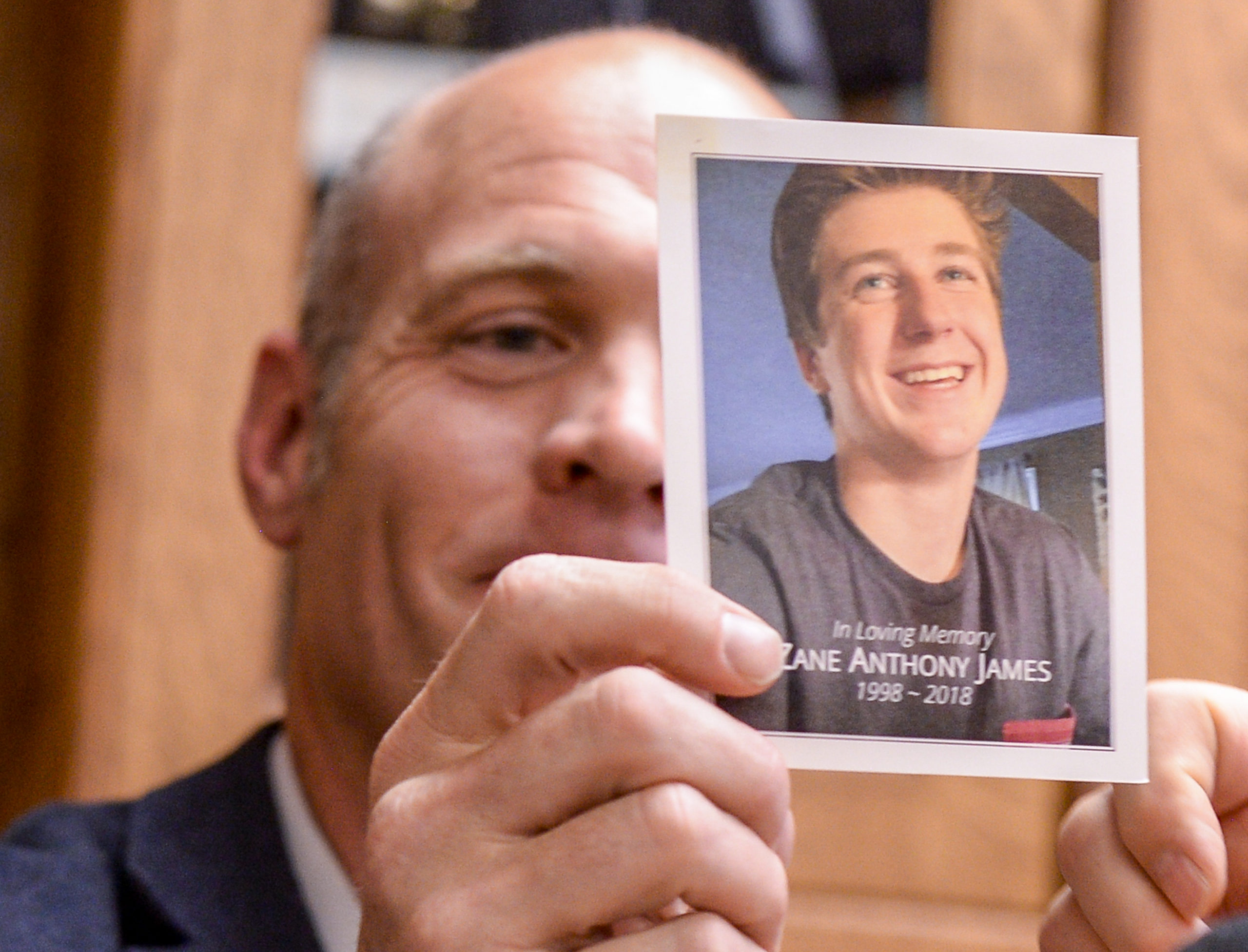 (Leah Hogsten  |  The Salt Lake Tribune)  Aaron James holds a photograph of his son, Zane James, who died after being shot by a Cottonwood Heights officer on May 29, 2018.
