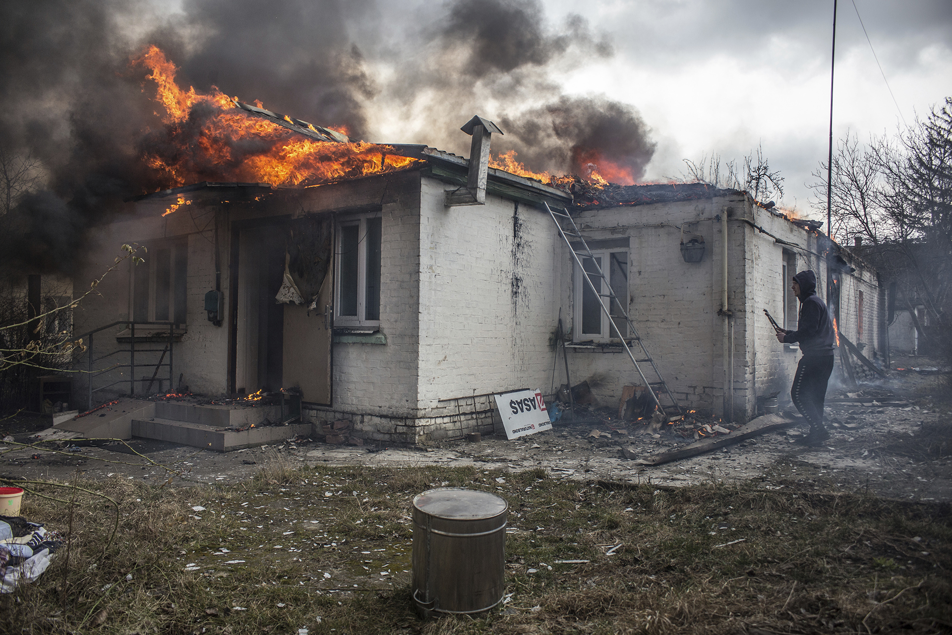 A house burns following shelling of Irpin, Ukraine, 26 kilometers (16 miles) west of Kyiv, Friday, March 4, 2022. When Russian troops crossed from Belarus into Ukraine in late February, pressing toward Kyiv, they were ordered to block and destroy “nationalist resistance,” according to the Royal United Services Institute, a London think tank that has reviewed copies of Russia’s battle plans. (AP Photo/Oleksandr Ratushniak, File)