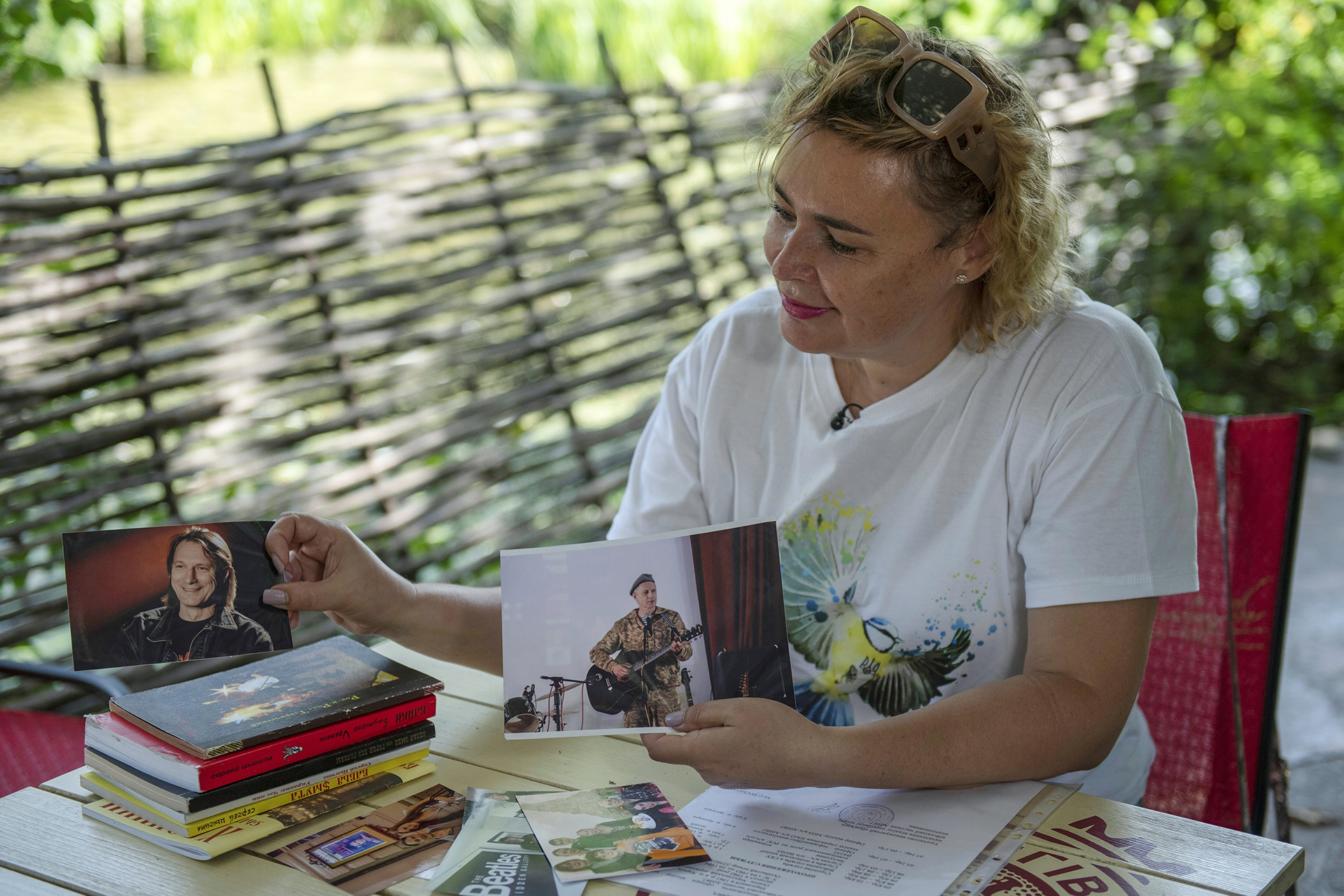 Olena, wife of Serhii Tsyhipa, a blogger, activist and military veteran, speaks about her husband during an interview with The Associated Press in Kyiv, Ukraine, Aug. 22, 2022. He vanished March 12 and reappeared six weeks later on pro-Russian television, thin and hollow-eyed, regurgitating Russian propaganda. Ukrainian police analyzed the video and told AP he was clearly under duress. (AP Photo/Andrew Kravchenko)