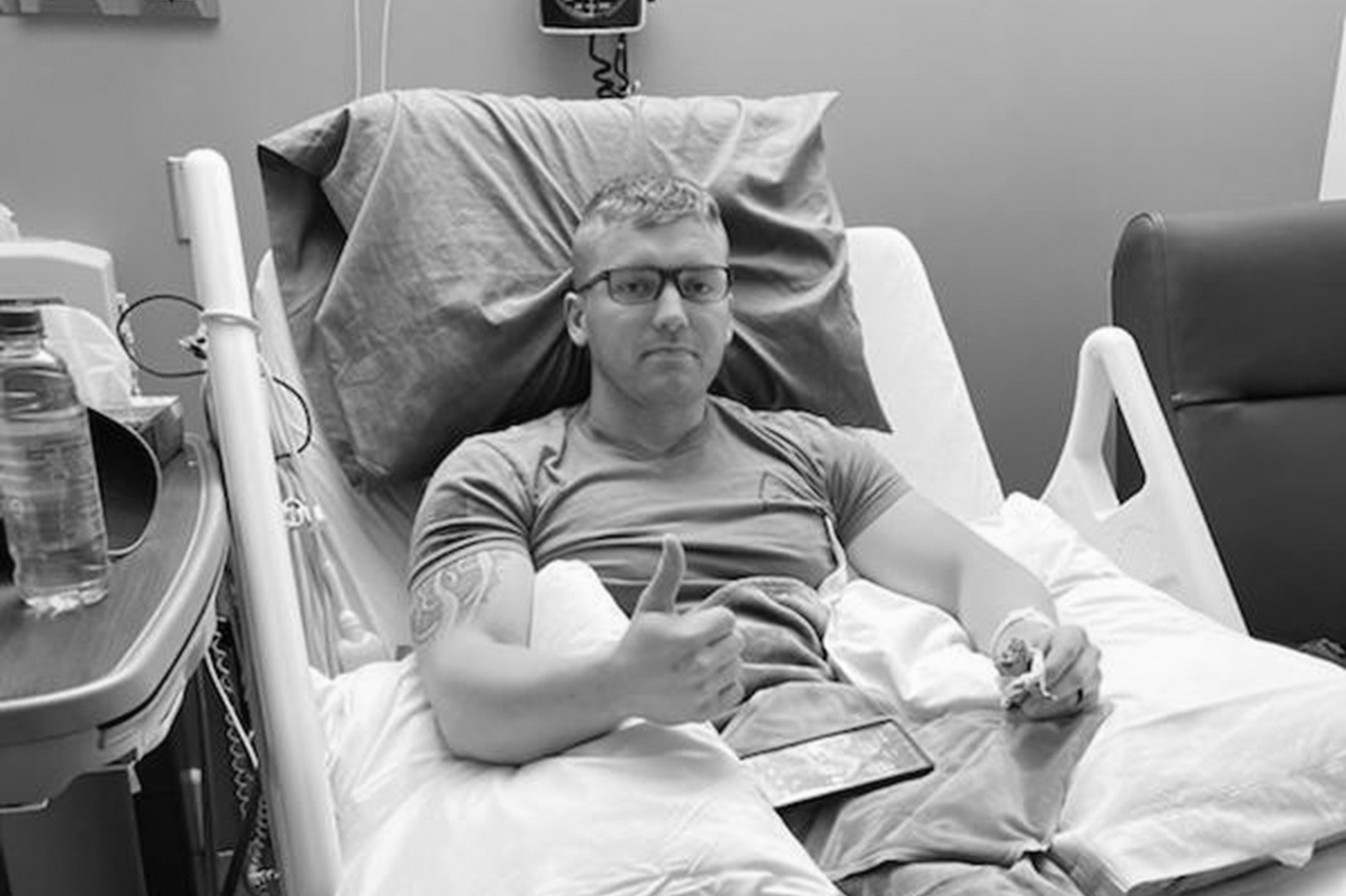 This family photo shows Tanner Corum at the Encompass Health Deaconess Rehabilitation Hospital in Newburgh, Ind., in March 2023, days after the Evansville, Ind., Police Department recruit was injured during "Big Fight " day training. (Courtesy Corum family via AP)