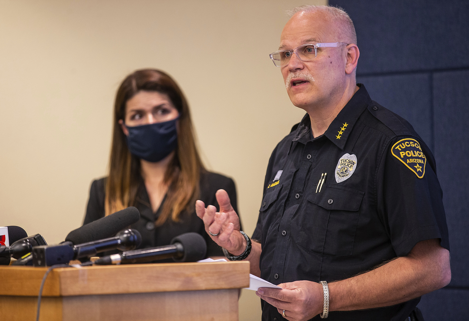 FILE - Then-Tucson Police Chief Chris Magnus, right, speaks as Mayor Regina Romero listens during a news conference in Tucson, Ariz., on June 24, 2020, in which he acknowledged that the department had waited more than two months to publicly reveal the death of Carlos Adrian Ingram Lopez during an encounter with officers. (Josh Galemore/Arizona Daily Star via AP, File)