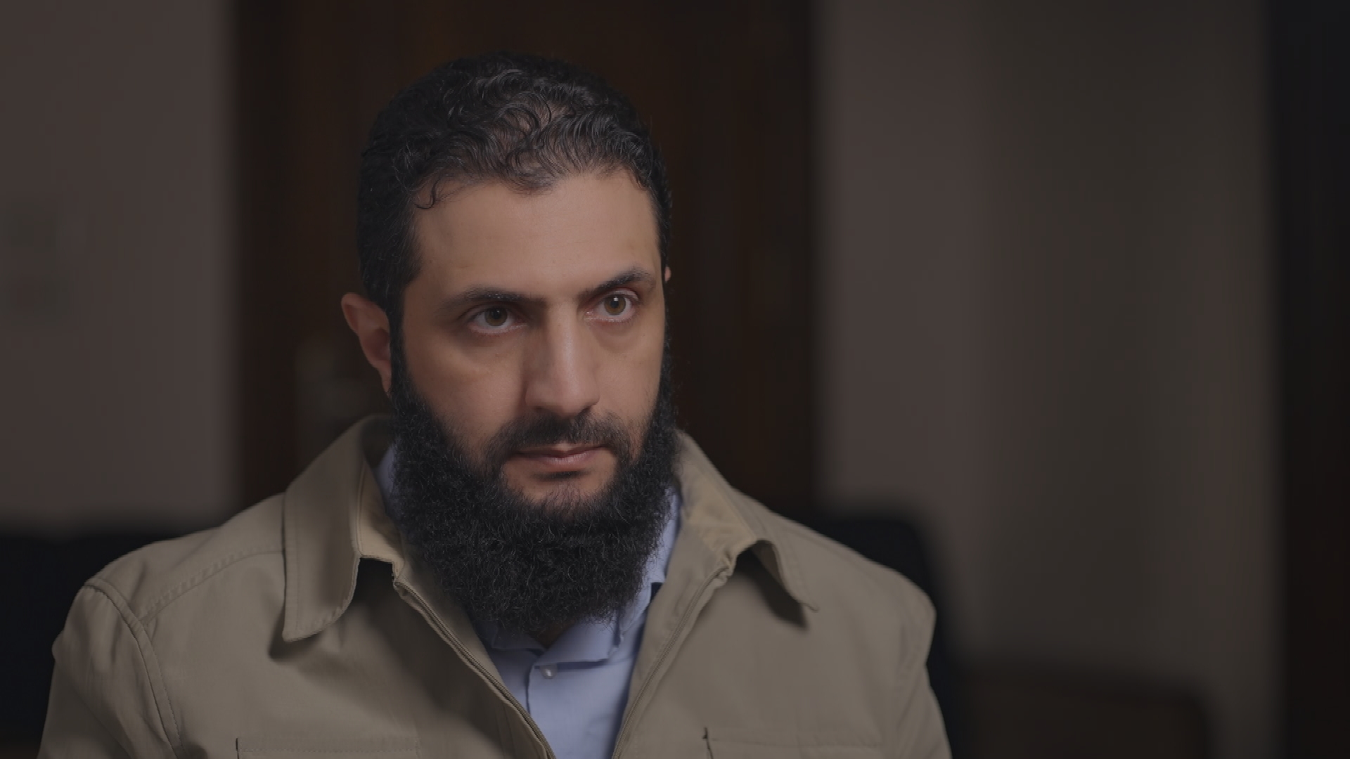 Abu Mohammad al-Jolani, pictured in a 2021 interview with Martin Smith.