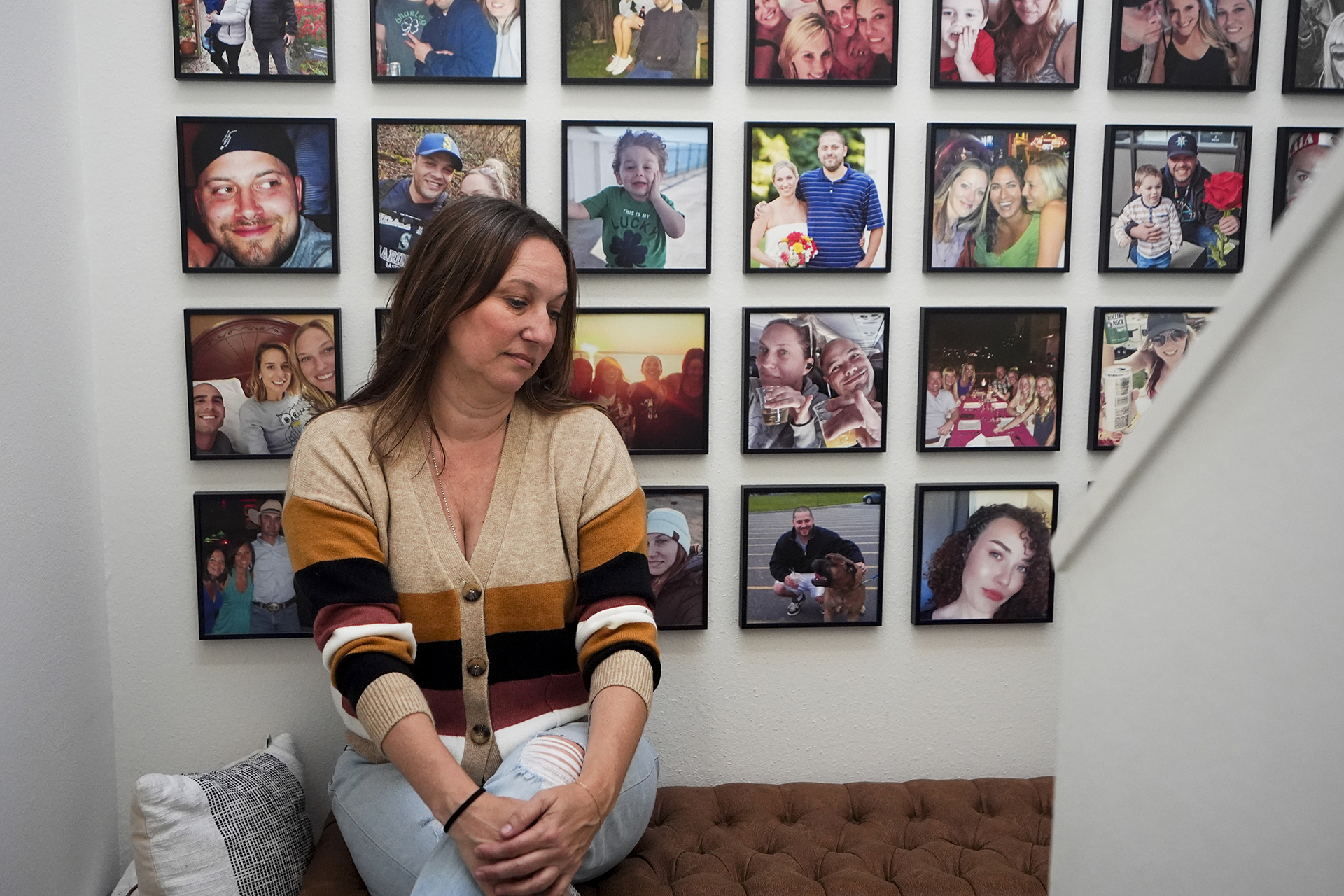 Jen Dold, whose brother, Alex Dold, lived with schizophrenia and died after a 2017 encounter with sheriff's deputies and police officers, sits for a portrait at her home Wednesday, Sept. 18, 2024, in Edmonds, Wash. (AP Photo/Lindsey Wasson)