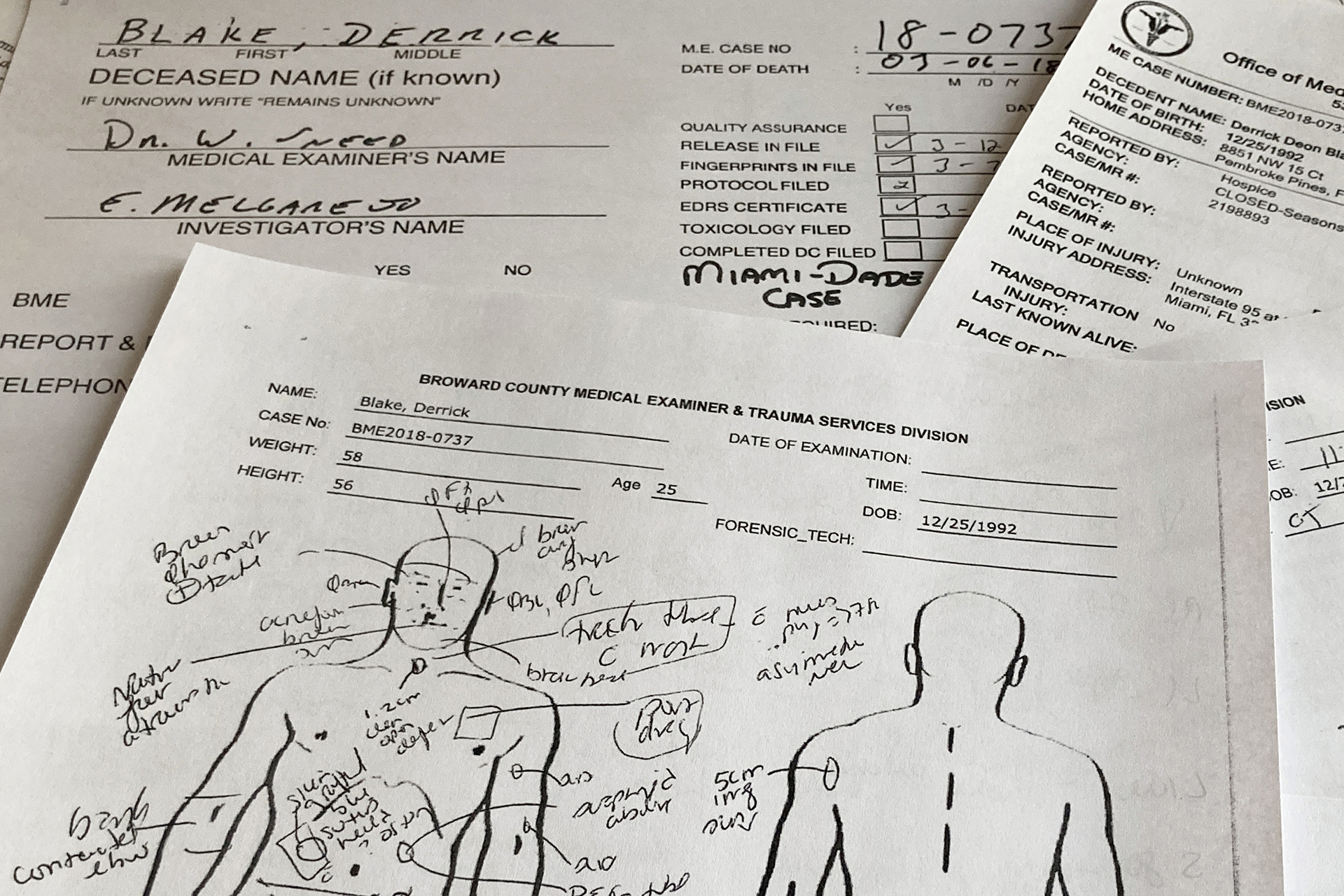Pages from a Broward County, Fla., medical examiner report and other documents related to the case of Derrick Blake, who died in a hospital on March 6, 2018, after being injured during an encounter with police in September 2012, are arranged for a photograph in New York on Nov. 12, 2024. (AP Photo/Patrick Sison)