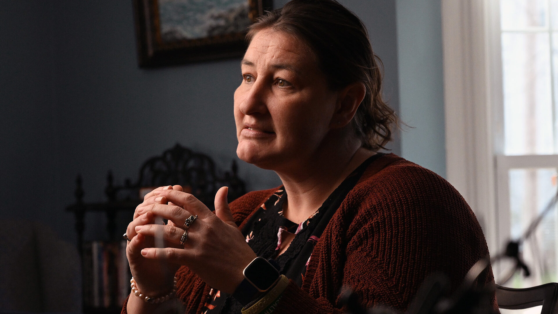 Nicole Herling speaks to a reporter about her brother’s traumatic brain injury, which researchers believe was “likely” caused by exposure to blasts during his experience in the Army Reserves.