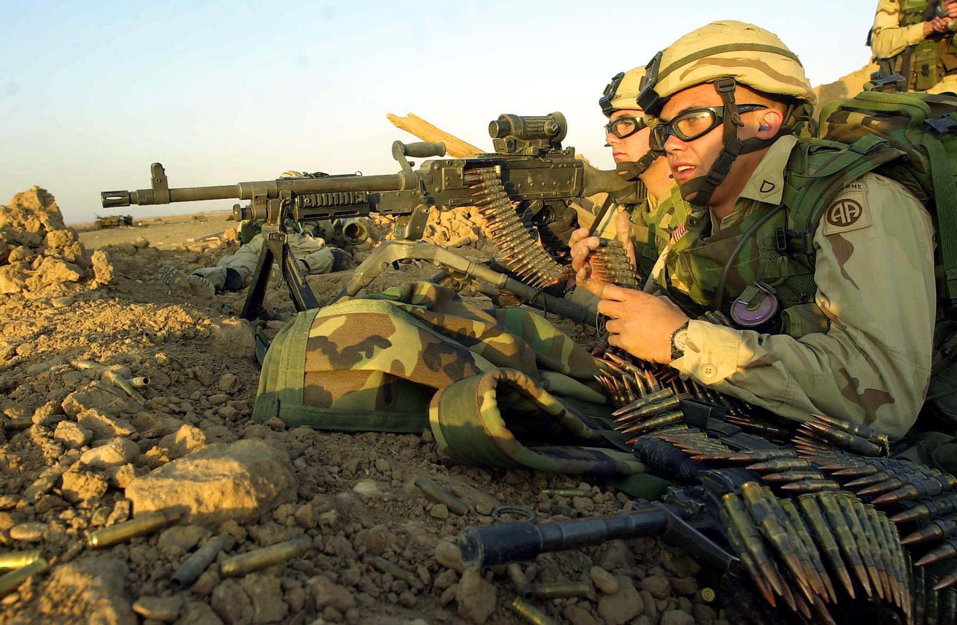** FILE ** Soldiers of the 3rd Platoon, Bravo Company, 2nd Battalion, 504th PIR of U.S. Army's 82nd Airborne shown in this Jan. 21, 2003 file photo, hold a position near a fictitious enemy during a live fire training at a firing range near the U.S. base in Kandahar, Afghanistan. U.S. and coalition forces are fighting a pitched battle against a group of 80 rebel forces aligned to renegade leader Gulbuddin Hekmatyar Tuesday, Jan. 28, 2003, in the largest-scale fighting in nine months, the U.S. military said Tuesday.(AP Photo/Eugene Hoshiko)