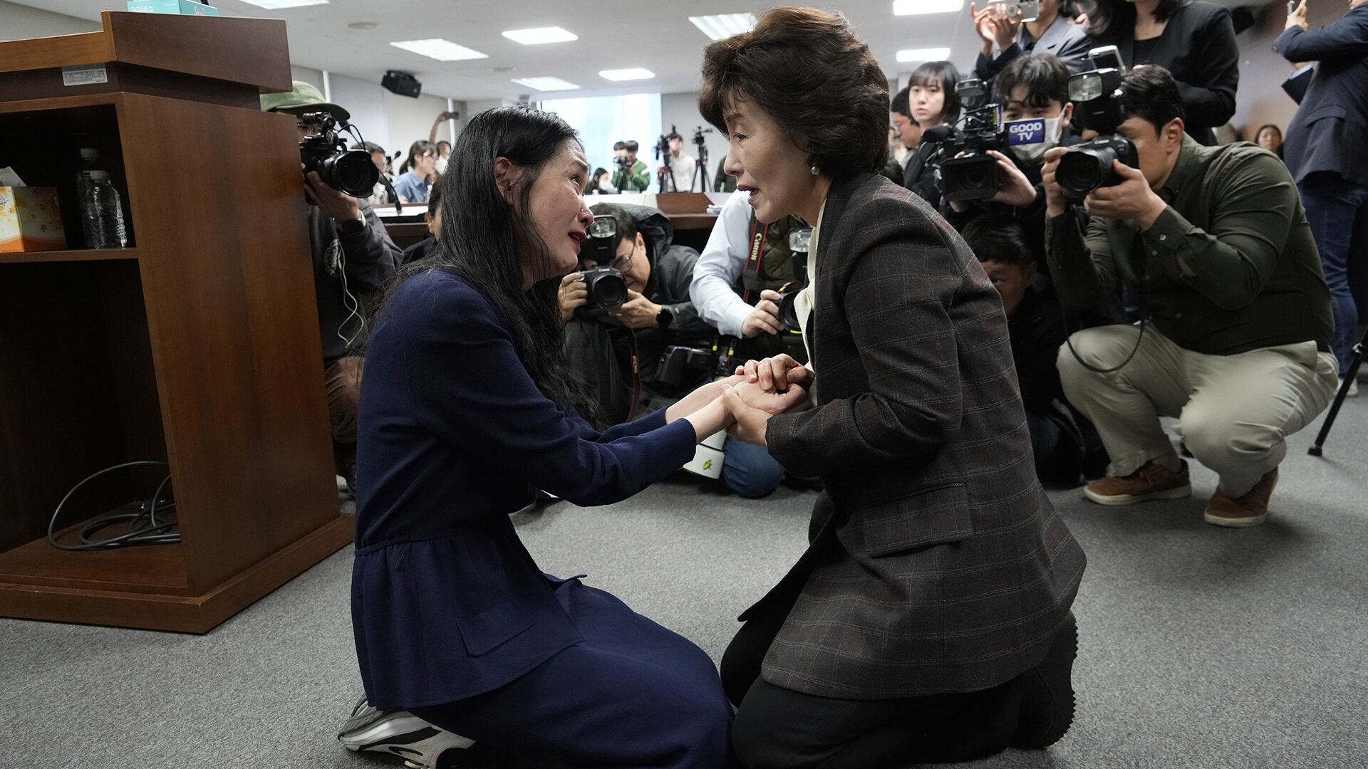 Truth and Reconciliation Commission Chairperson Park Sun Young, right, comforts adoptee Yoo-ree Kim during a press conference in Seoul, South Korea, on March 26, 2025.