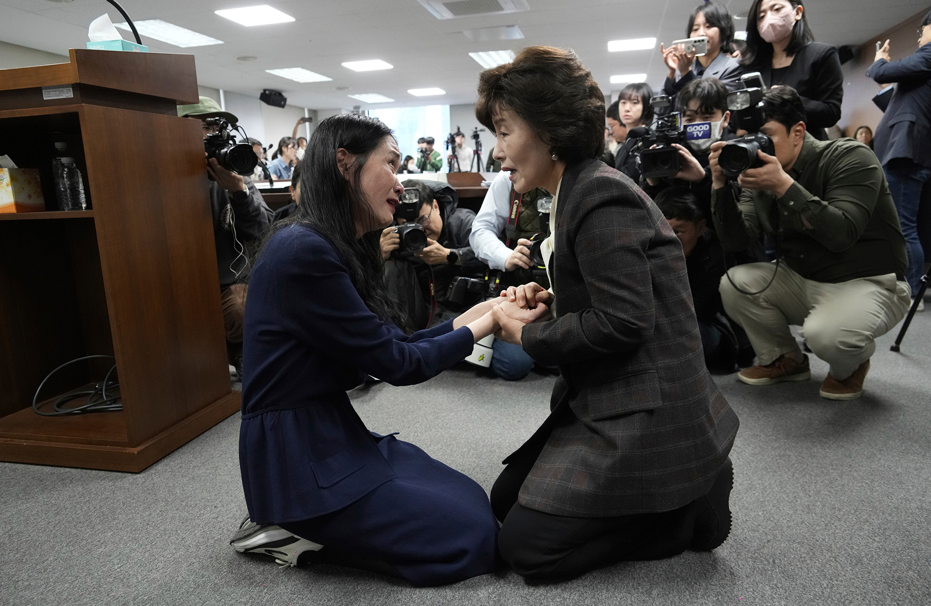 Truth and Reconciliation Commission Chairperson Park Sun Young, right, comforts adoptee Yoo-ree Kim during a press conference in Seoul, South Korea, on March 26, 2025.