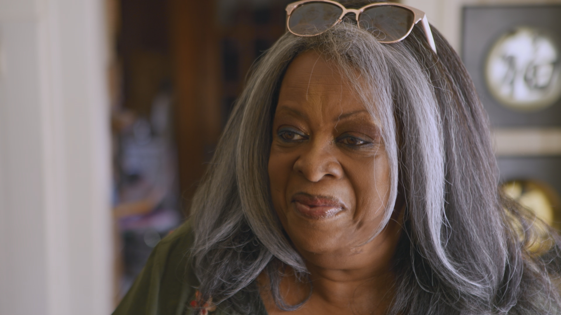 Jackie Stanley, whose tenacity and devotion to her family inspired public media audiences for decades in FRONTLINE’s "Two American Families" documentary series, died on June 3, 2025, at the age of 70. Here, she is pictured in a still image from last year's "Two American Families: 1991-2024."