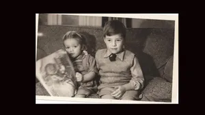 A candid, black and white photo of author James Herriot's young children Rosie and Jim.