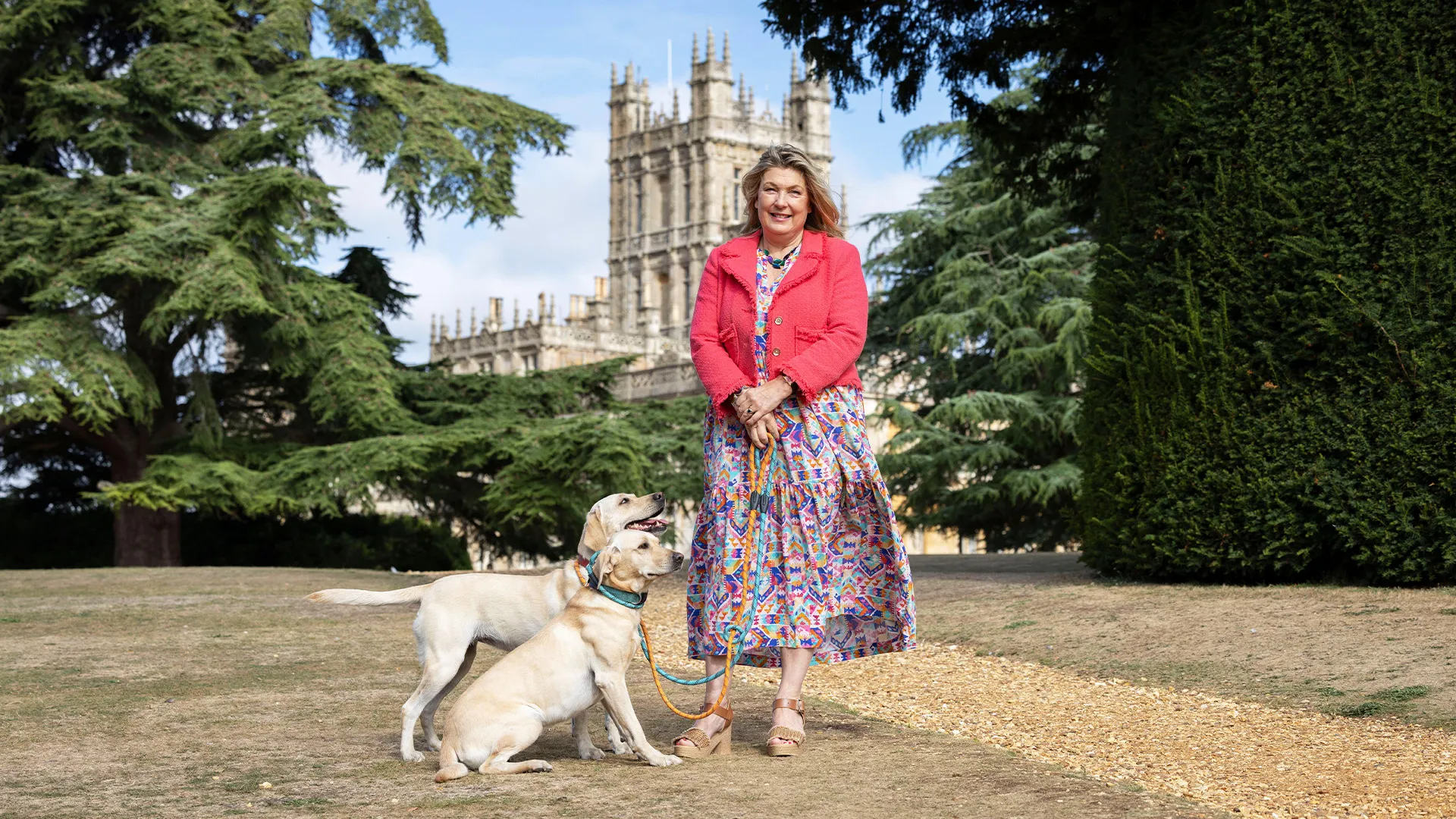 Color photo of the 8th Countess of Carnarvon, steward of Highclere Castle, outside the castle where Downton Abbey was filmed.