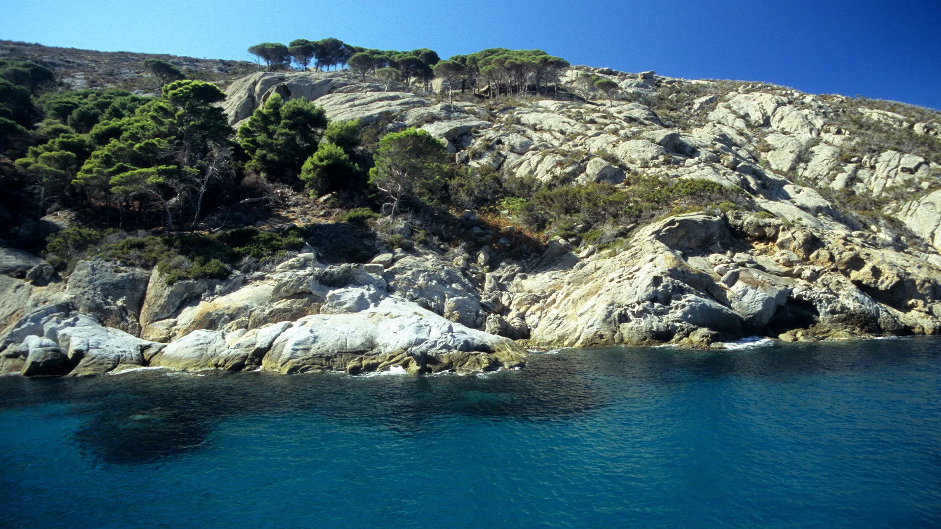 Color photo of the small island of Montecristo, off the coast of Tuscany, Italy.