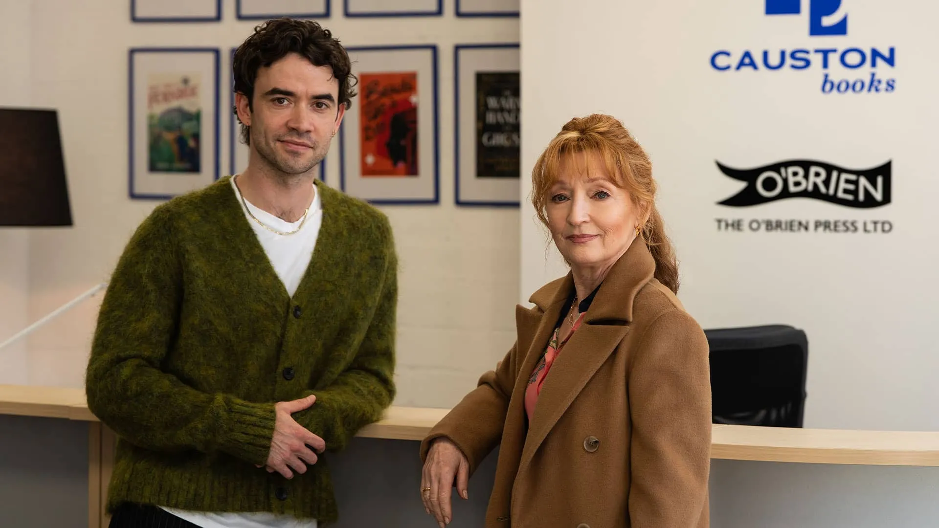 Eliot Crace and Susan Ryeland stand together at the publishing company