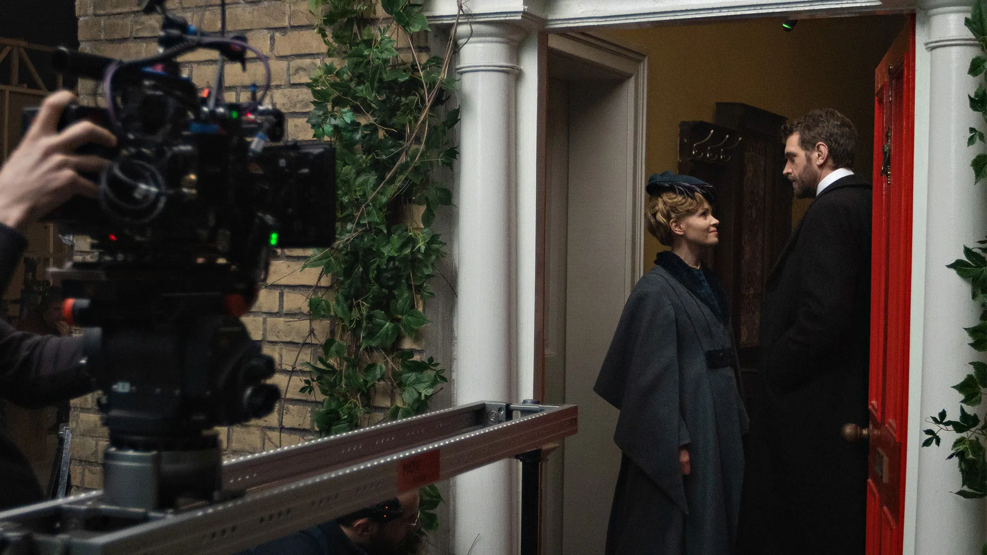 Kate Phillips as Eliza Scarlet and Tom Durant-Pritchard behind the scenes of Miss Scarlet Season 6