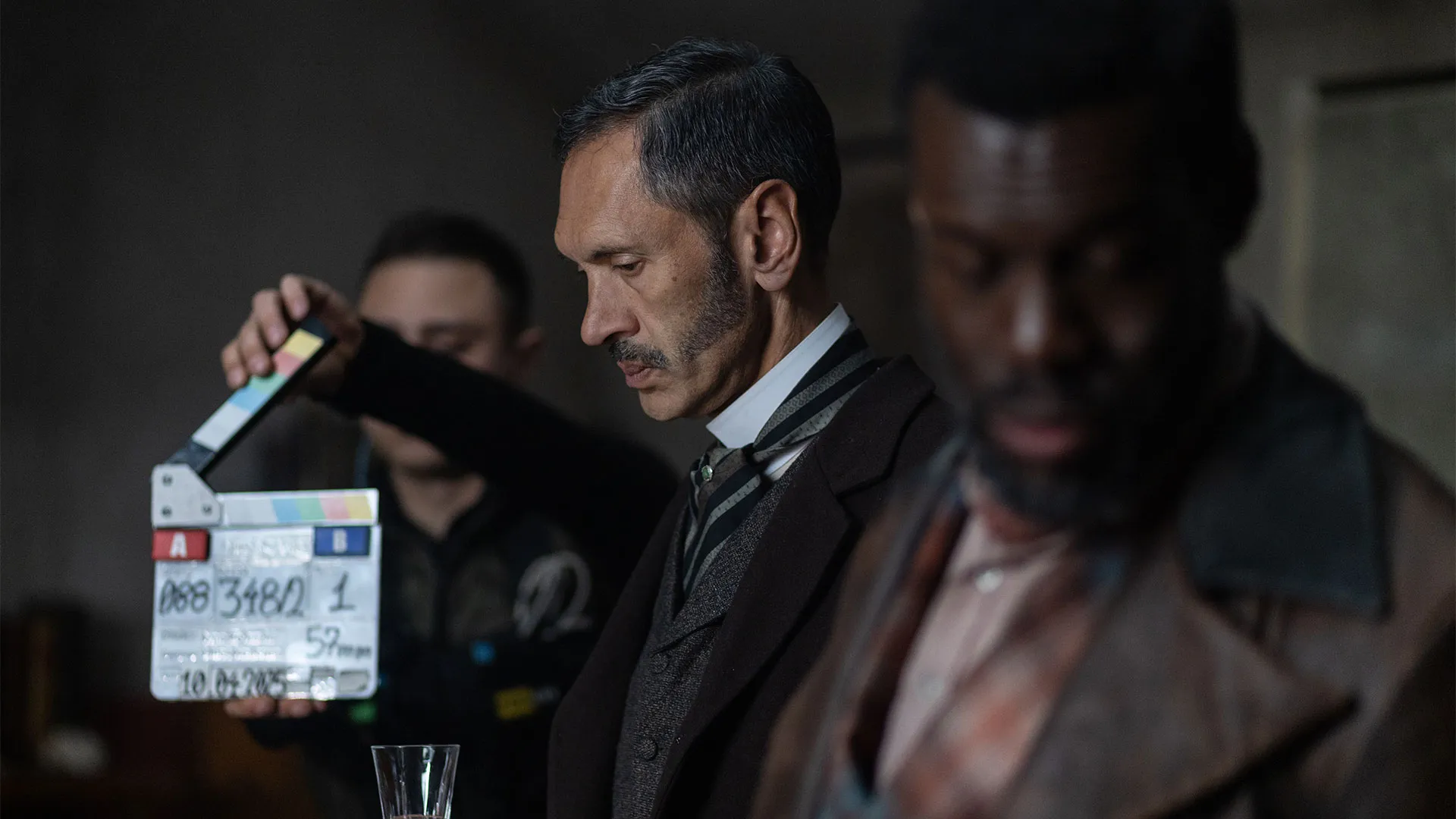 Paul Bazely (Clarence) and Ansu Kabia (Moses) getting ready to shoot a scene in Miss Scarlet Season 6