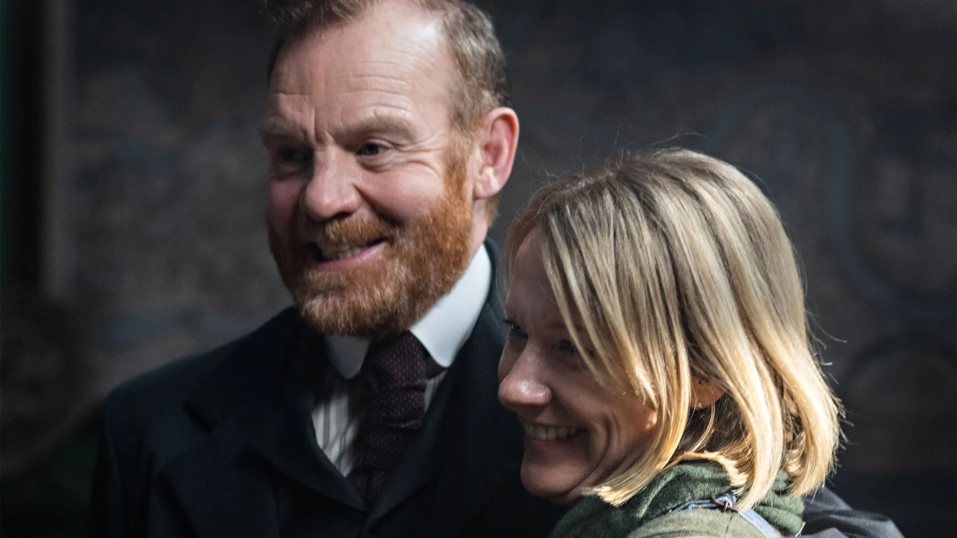 Tim Chipping (DS Phelps) and series creator Rachael New hugging behind the scenes of Miss Scarlet Season 6