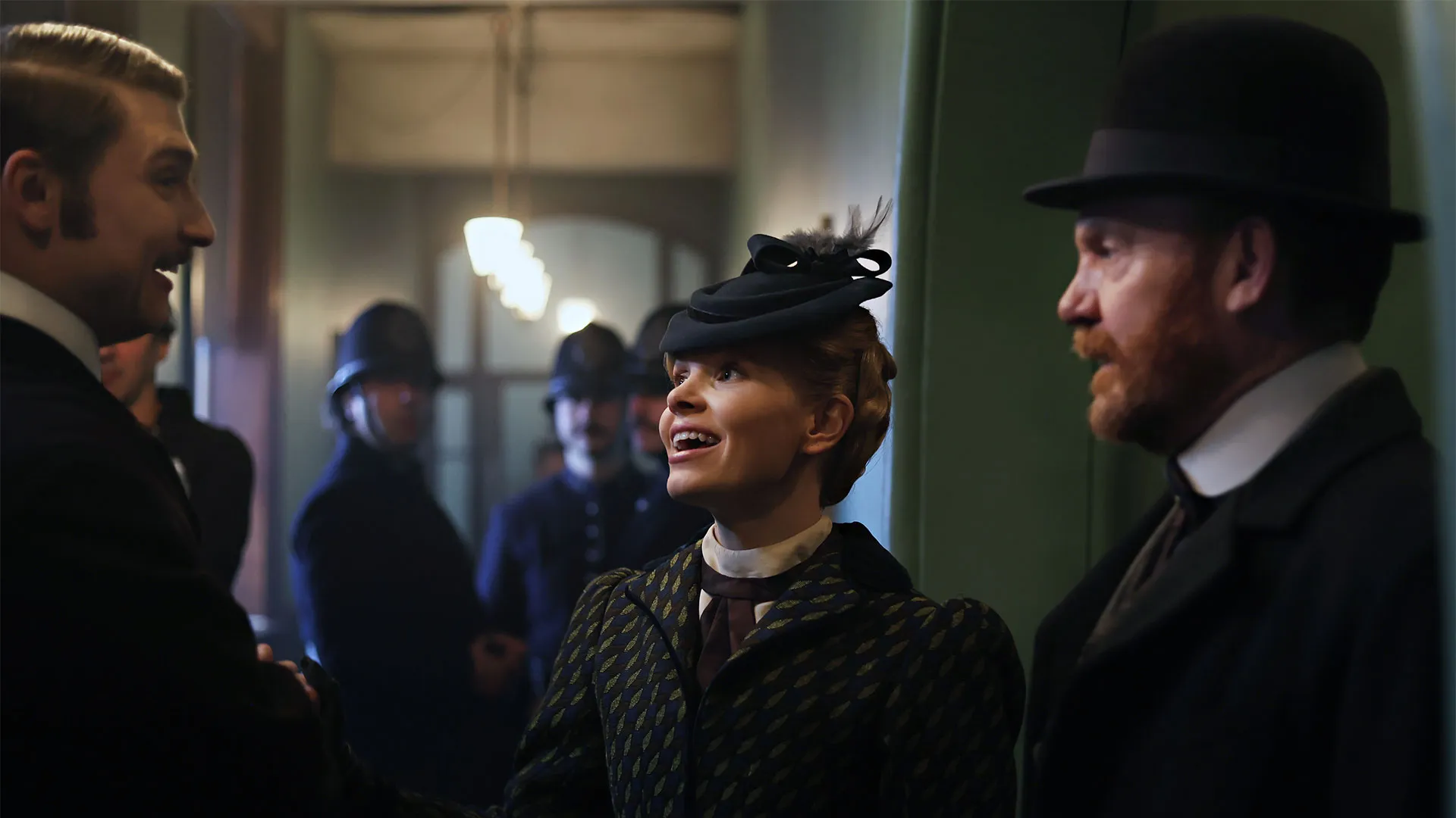 Sam Buchanan (Detective Willows), Kate Phillips (Eliza) and Tom Durant-Pritchard (Inspector Blake) chatting behind the scenes of Miss Scarlet Season 6