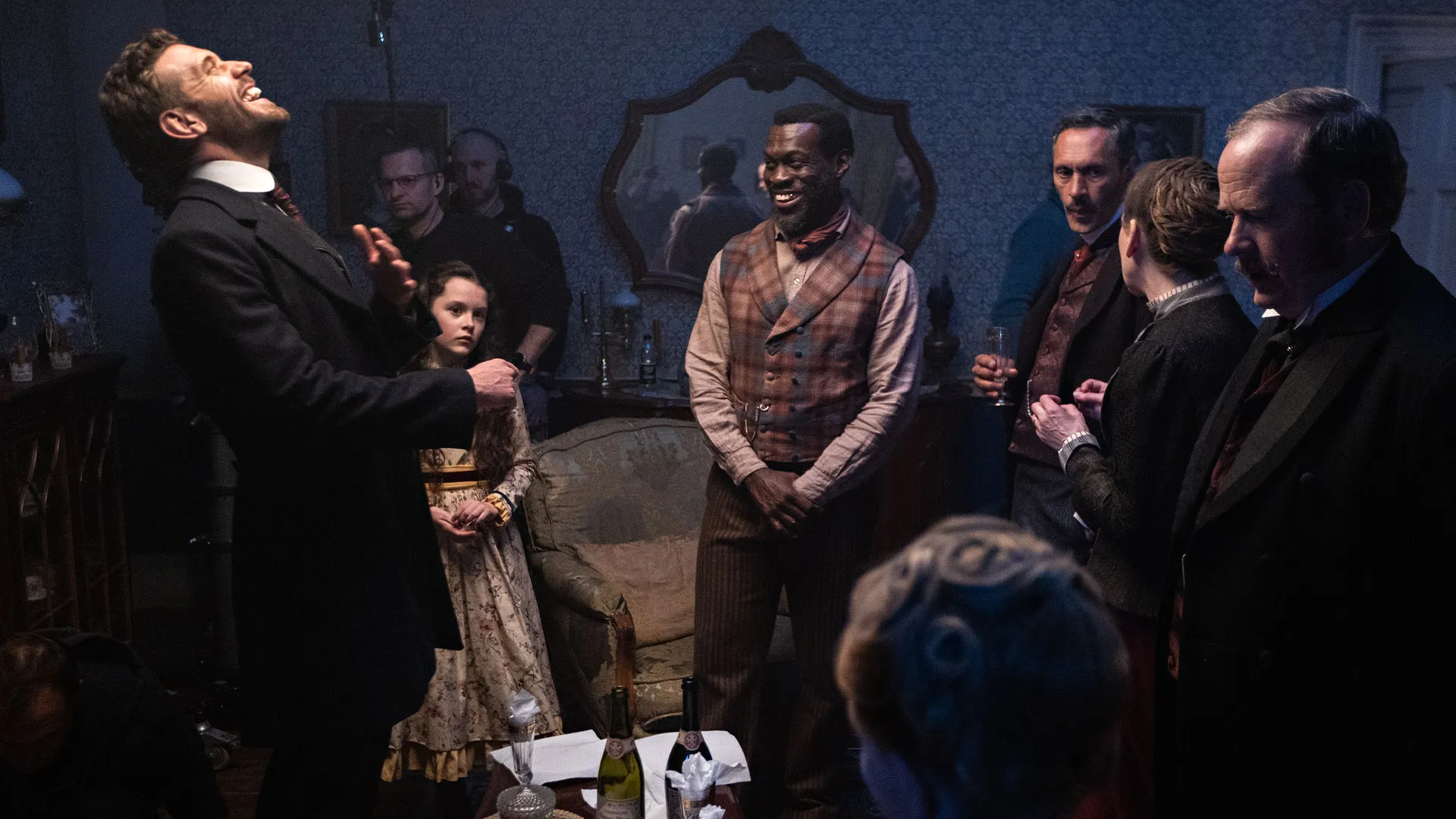 Tom Durant-Pritchard (Inspector Blake), Ansu Kabia (Moses), Paul Bazely (Clarence), Cathy Belton (Ivy), Simon Ludders (Mr. Potts) and more laughing together behind the scenes of Miss Scarlet Season 6