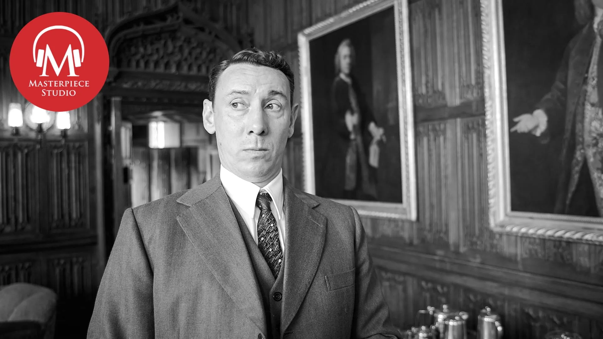 Black and white photo of actor al weaver as leonard finch in grantchester with the red MASTERPIECE Studio logo in the top left