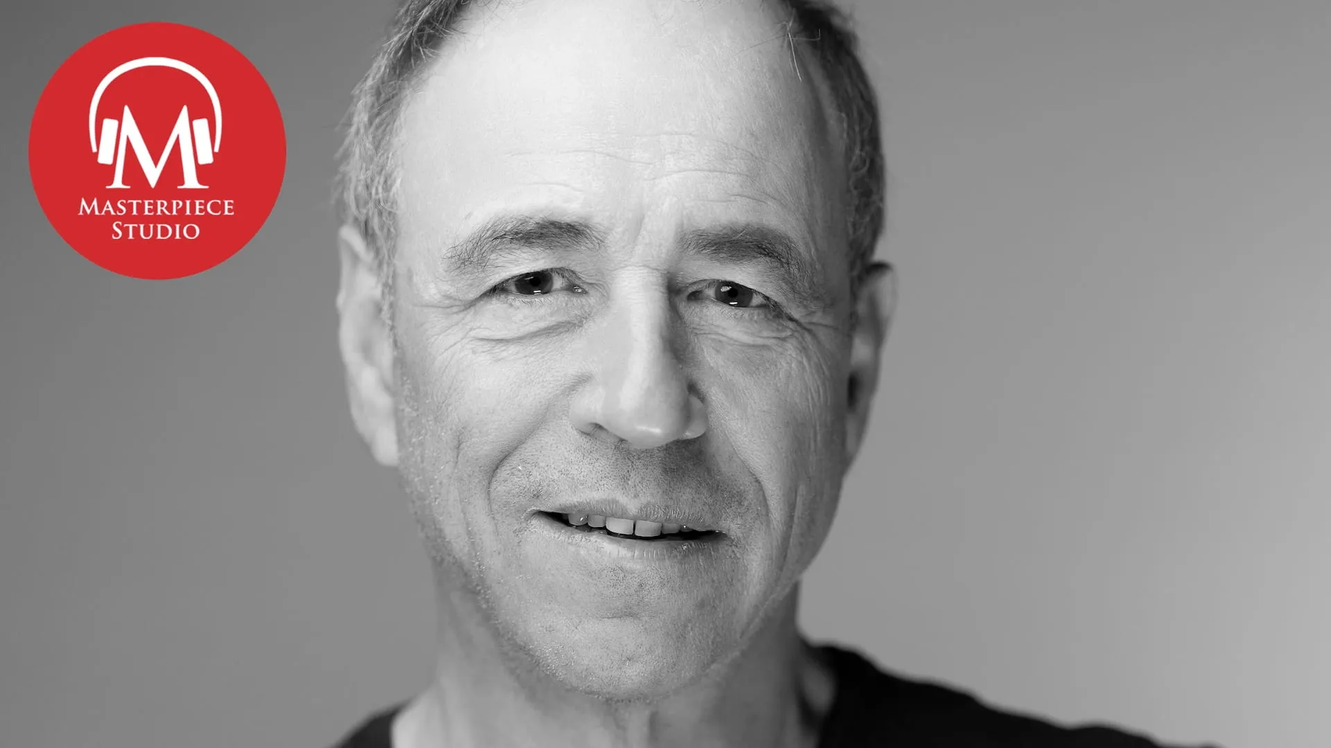 black and white photo of writer anthony horowitz with the red masterpiece studio logo in the top left corner