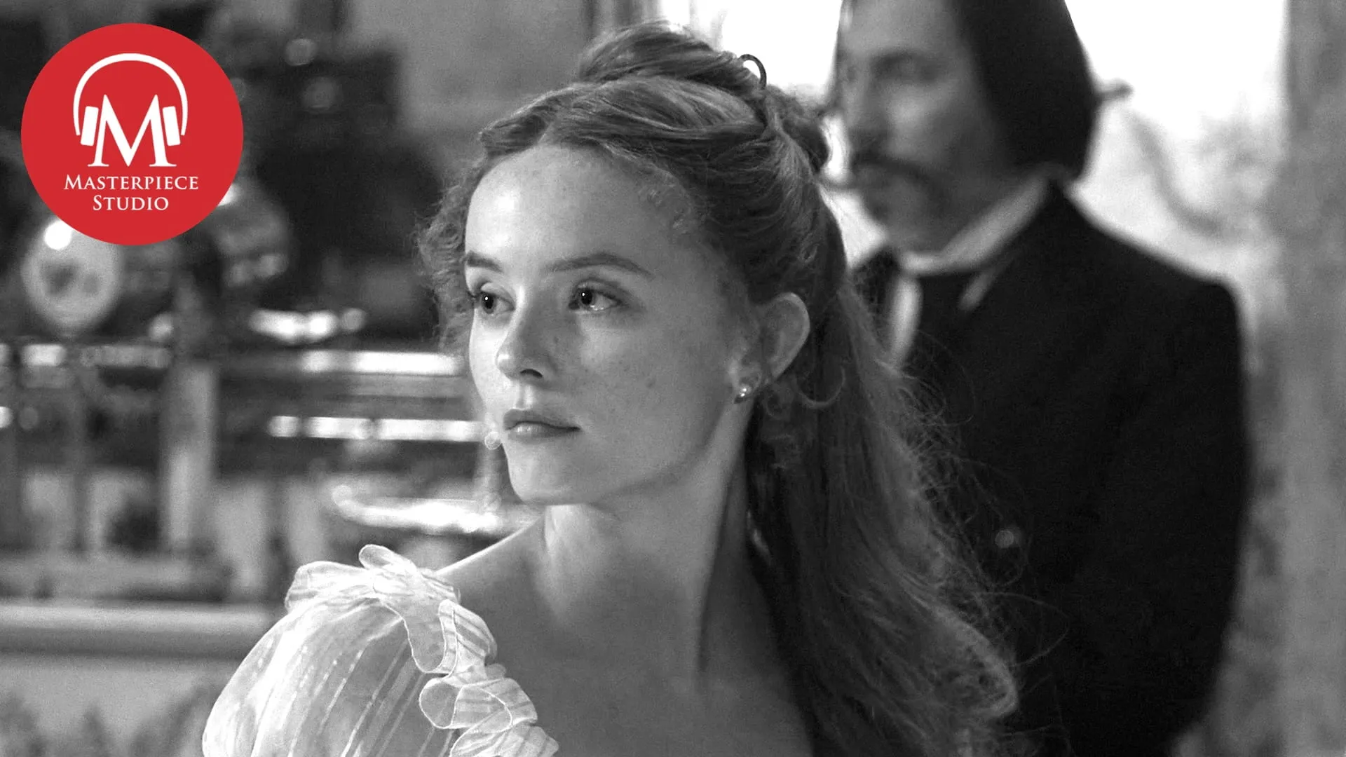 Black and white photo of actor millie gibson as irene heron in the forsytes with the red masterpiece studio logo in the top left