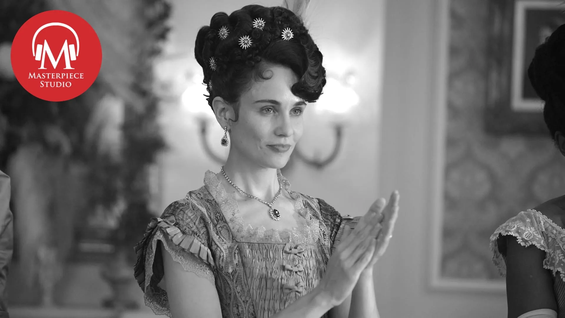 black and white photo of actor tuppence middleton as frances forsyte with the red and white masterpiece studio logo in the top left