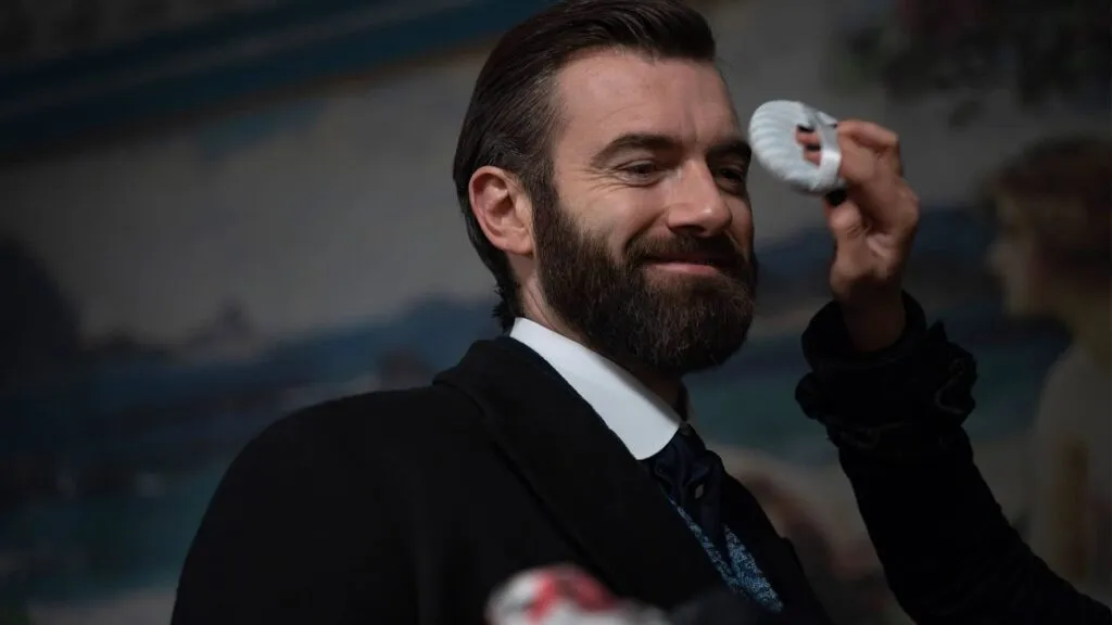 Stuart Martin getting a makeup touch-up behind the scenes of Miss Scarlet and The Duke Season 4