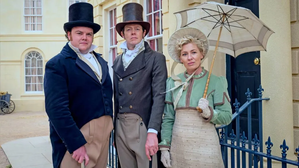 Turlough Convery (Arthur Parker), Kris Marshall (Tom Parker), and Kate Ashfield (Mary Parker) in Sanditon Season 2.