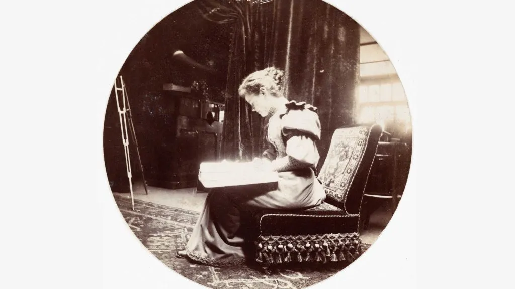 Woman reading, about 1890.