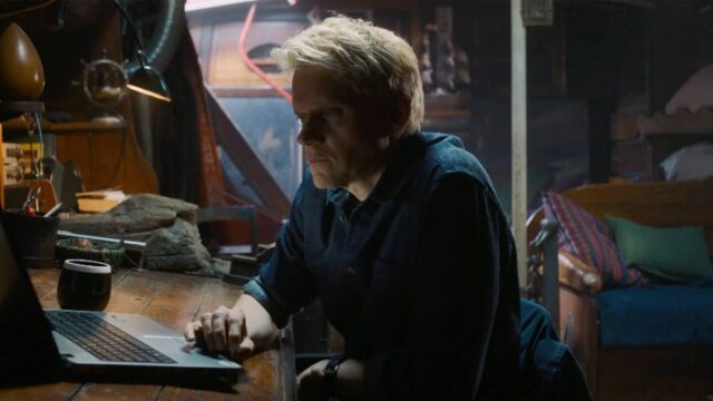 Marc Warren as Piet Van der Valk working at a computer in Van der Valk Season 5