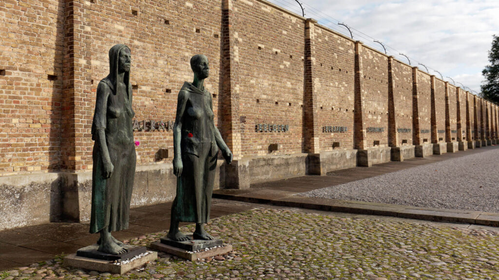 Color photo of sculptures of women at the Ravensbruck National Memorial in Germany.