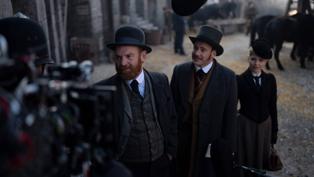 Tim Chipping, Felix Scott, and Kate Phillips filming Miss Scarlet and The Duke Season 4