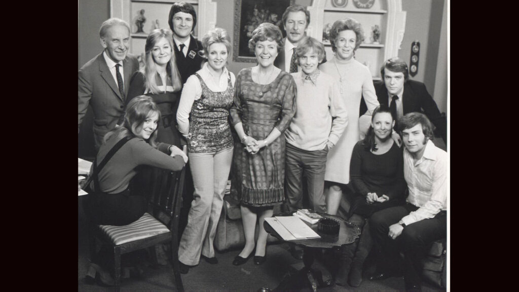 Black and white photo of the Crossroads cast in 1969.