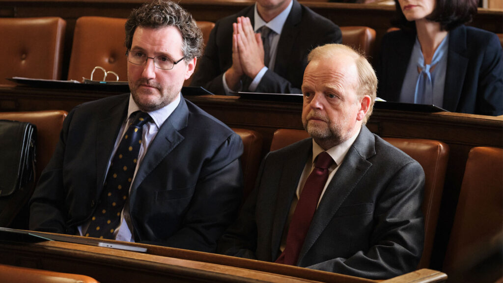 Actor John Hollingworth as solicitor James Hartley (right) and Toby Jones as former Subpostmaster Alan Bates in a scene from Mr Bates and The Post Office airing on PBS MASTERPIECE.