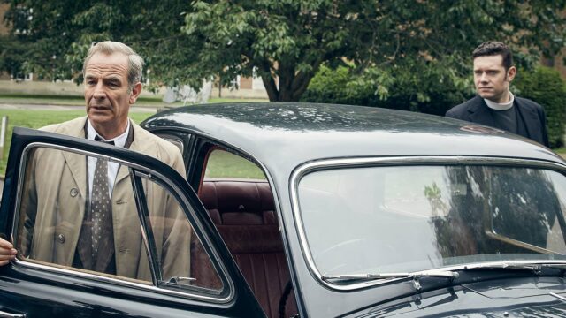 Robson Green as Geordie Keating and Tom Brittney as Will Davenport exiting a car in Grantchester Season 9