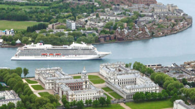 Viking's ocean cruise ship on a bend of the River Thames.