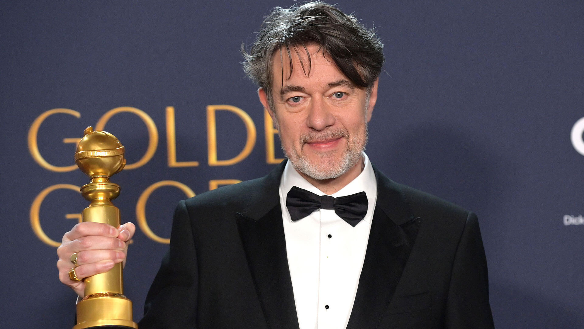 Screenwriter Peter Straughan receiving a Golden Globe Award