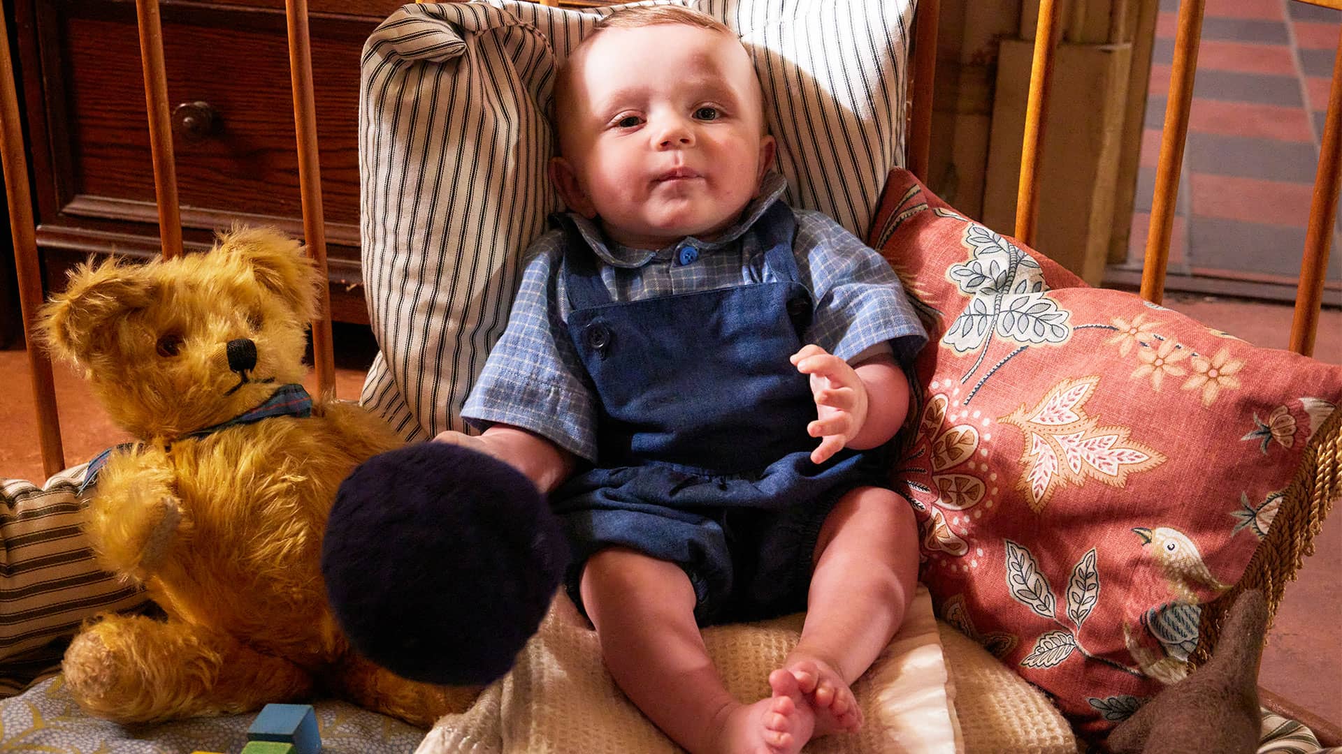 Baby Jimmy in his crib in All Creatures Great and Small Season 5