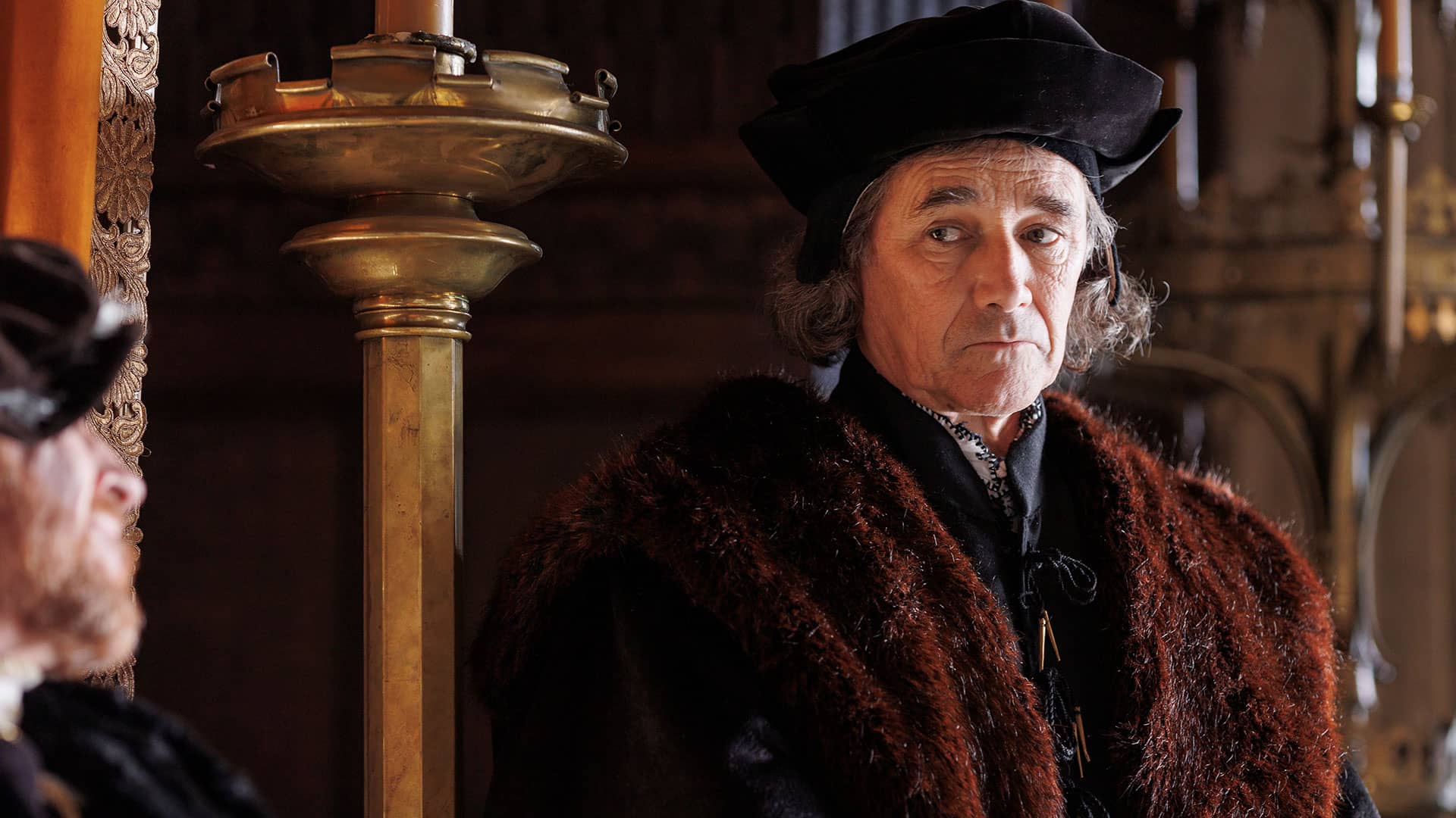 Thomas Cromwell looks warily at King Henry VIII