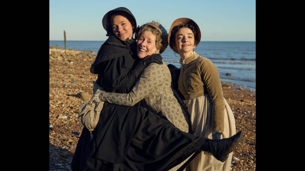 Synnøve Karlsen, Phyllis Logan, and Patsy Ferran enjoy a moment behind the scenes of Miss Austen