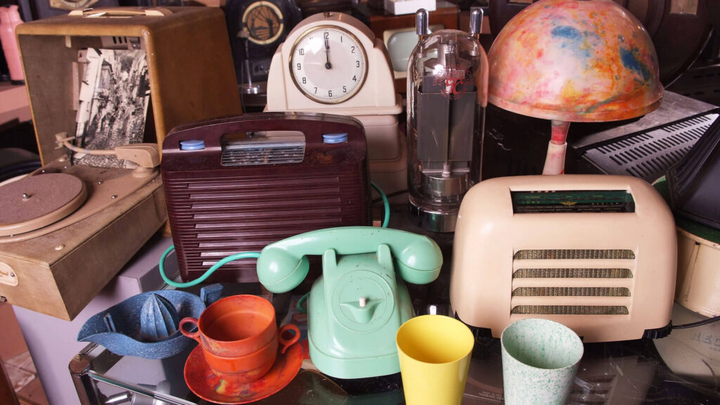 Bakelite Museum exhibit, including TVs, radios, household and industrial items made in early plastic.