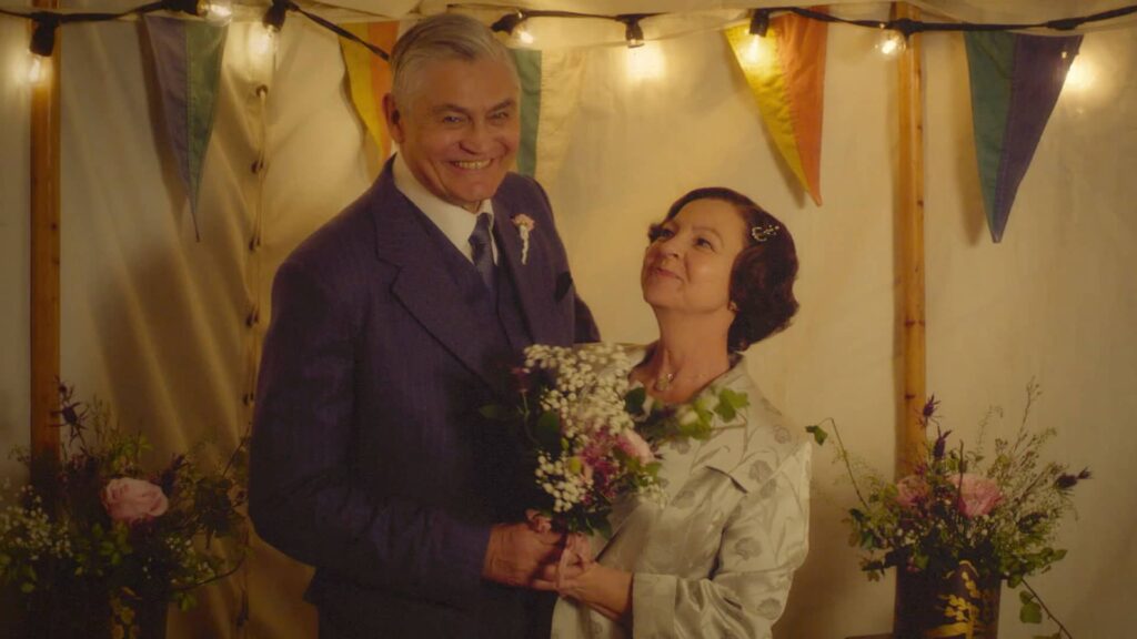 Nick Brimble and Tessa Peake-Jones as Jack and Mrs. C. at their wedding Grantchester Season 3