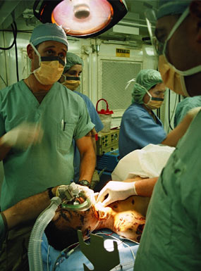 Surgeons prepare to operate
