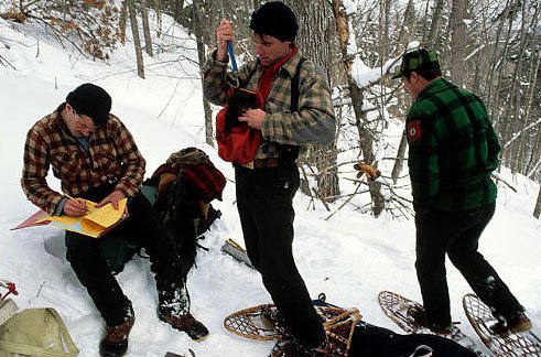 Biologists in snow