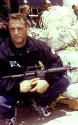 photo of a dea agent with a large cocaine seizure