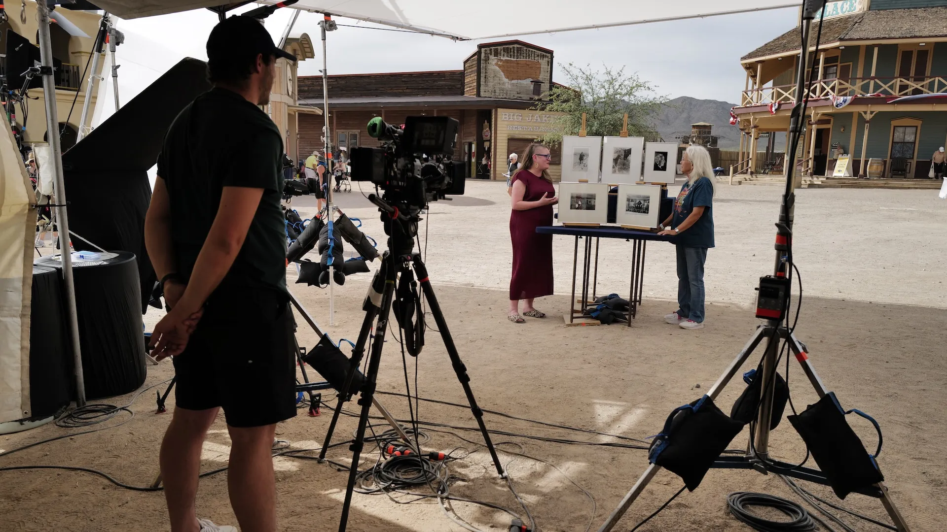 A photo of an appraisal of five photographs with crew in view